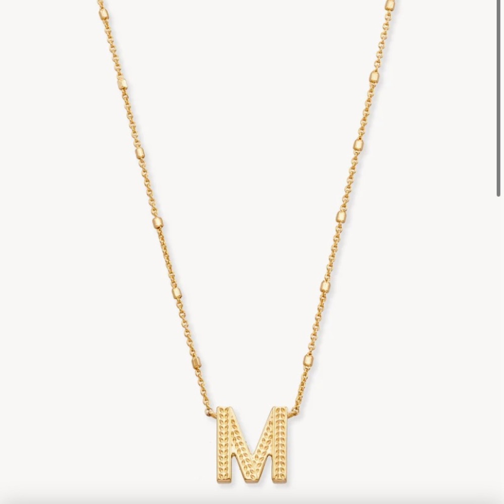 I’m selling a gold (M) Kendra Scott necklace